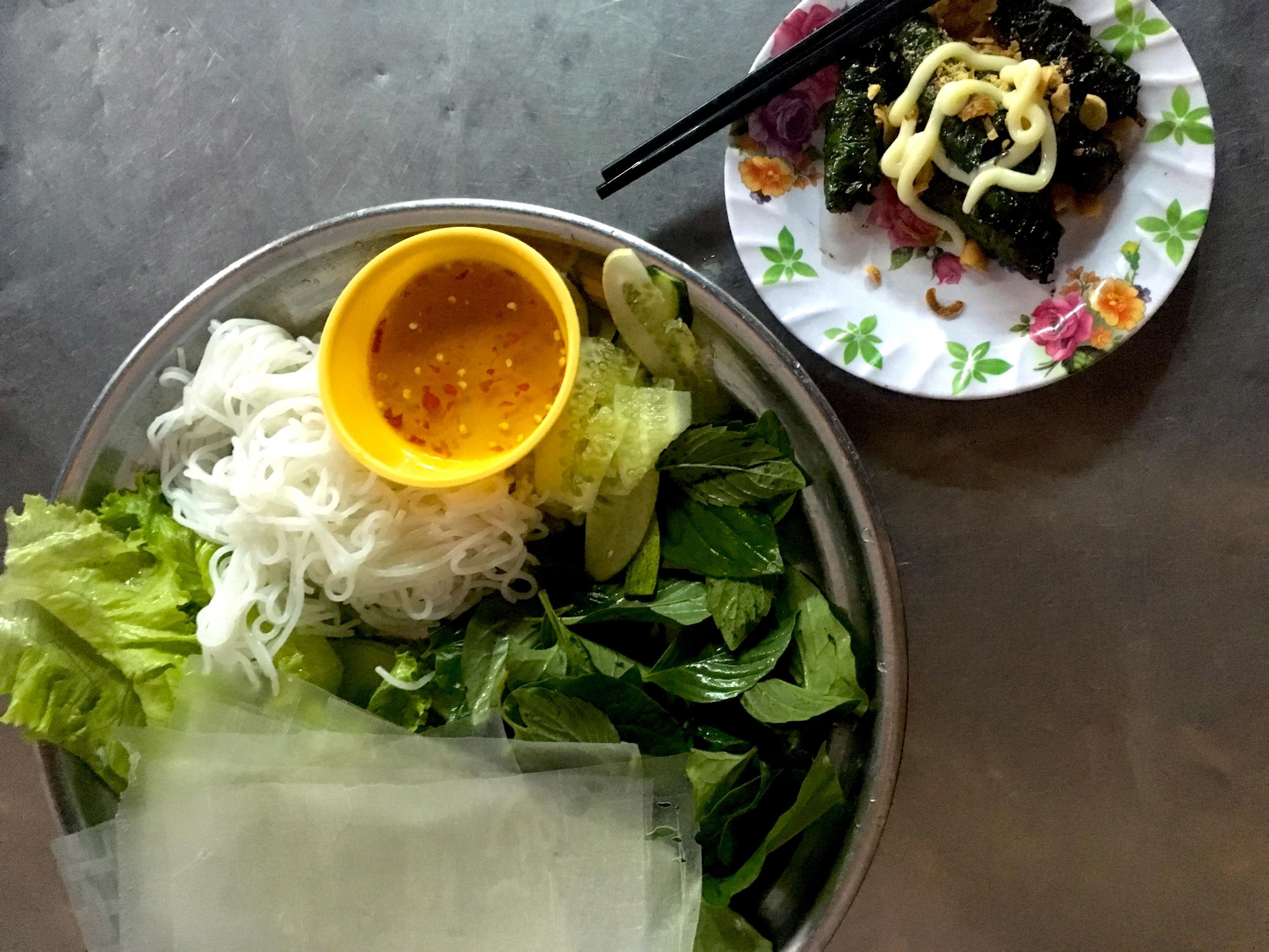 Bo la lot is minced beef wrapped in wild betel leaf