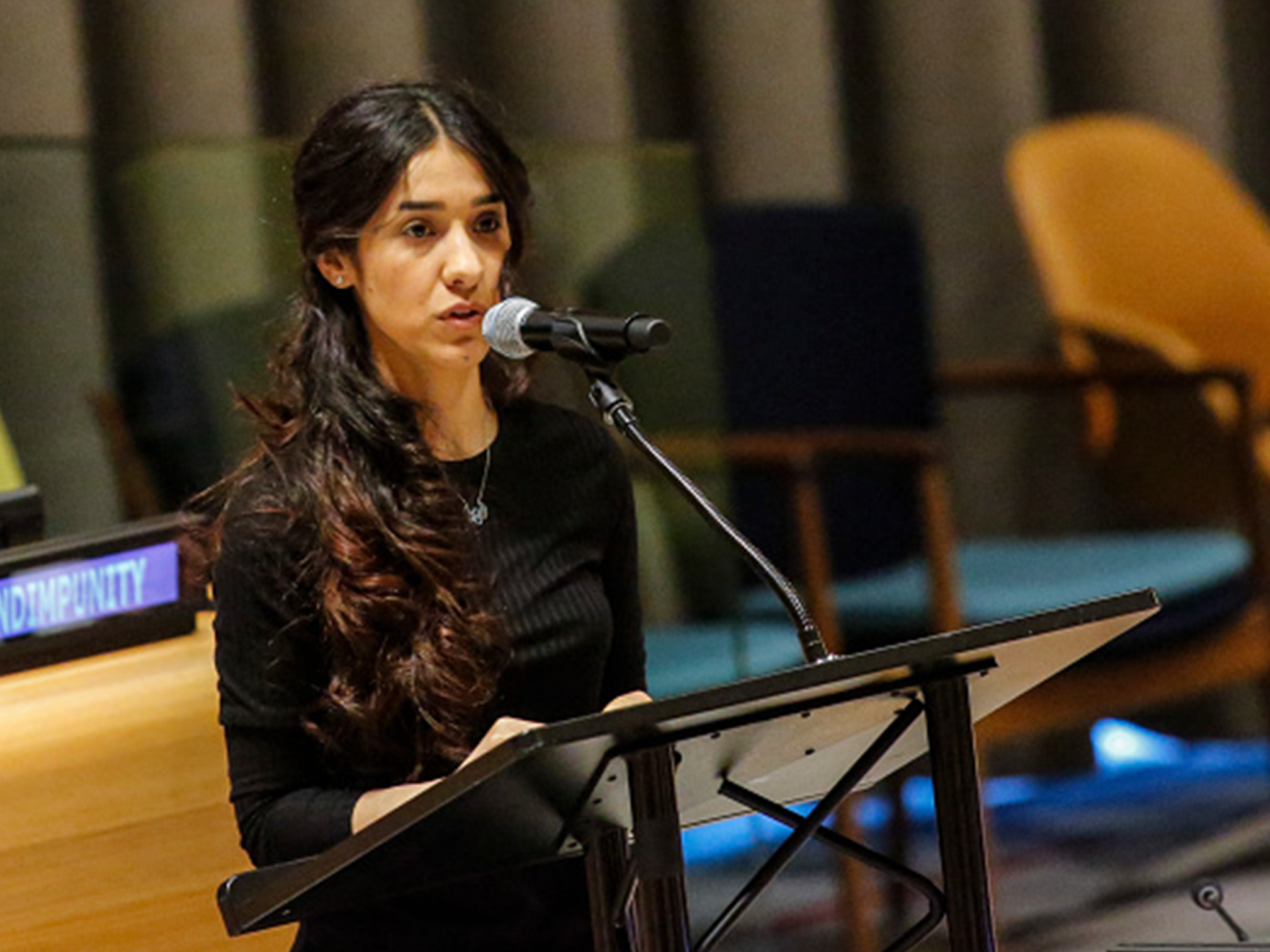 Yazidi human rights activist Nadia Murad speaks as she attends at the United Nations