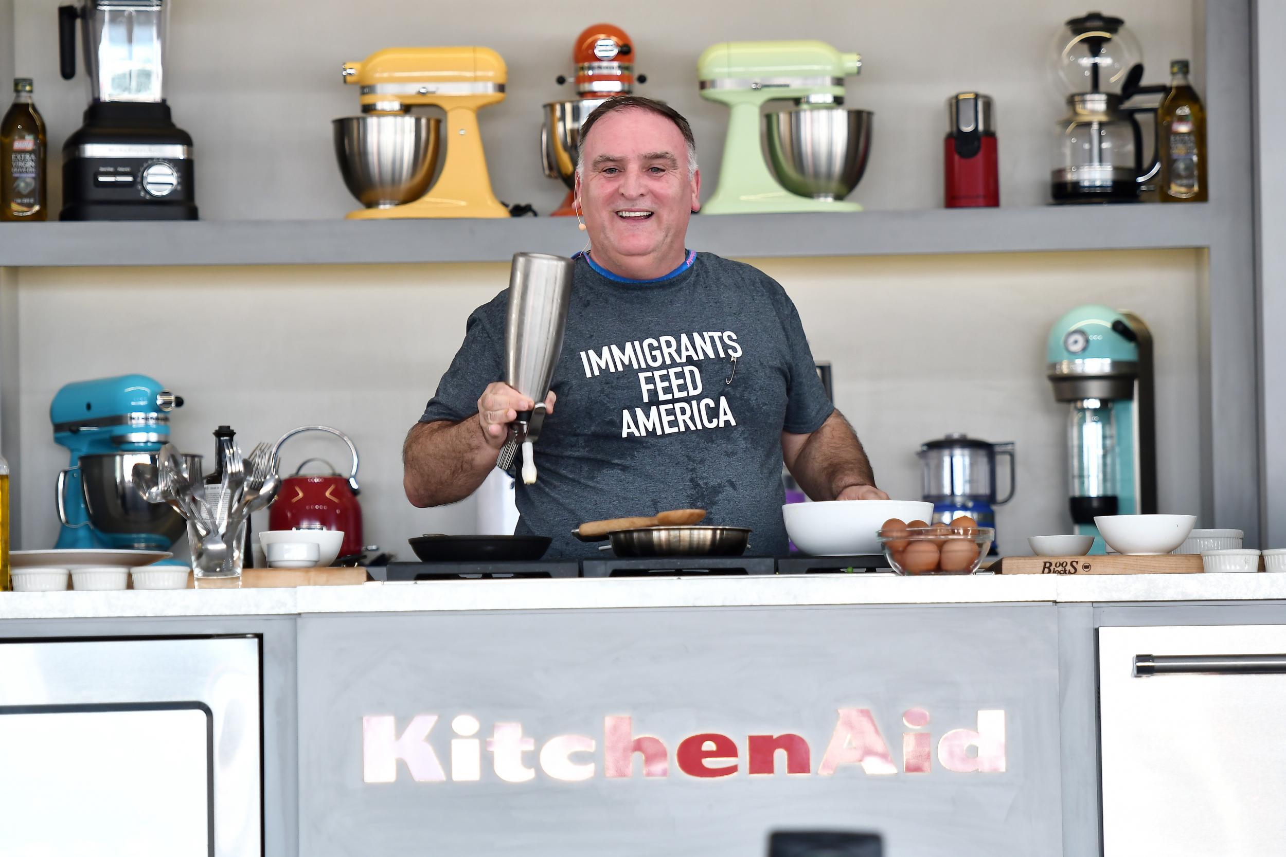 Chef Jose Andres leads a cooking demonstration on stage at Goya Foods' Grand Tasting Village