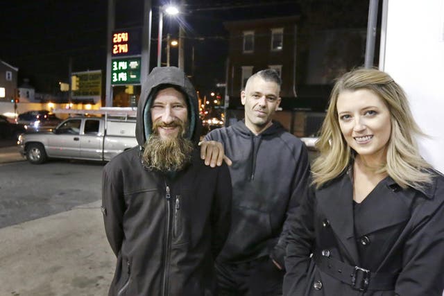 <p>File photo: Johnny Bobbitt Jr, left, Kate McClure, right, and her boyfriend Mark D'Amico pose in Philadelphia</p>