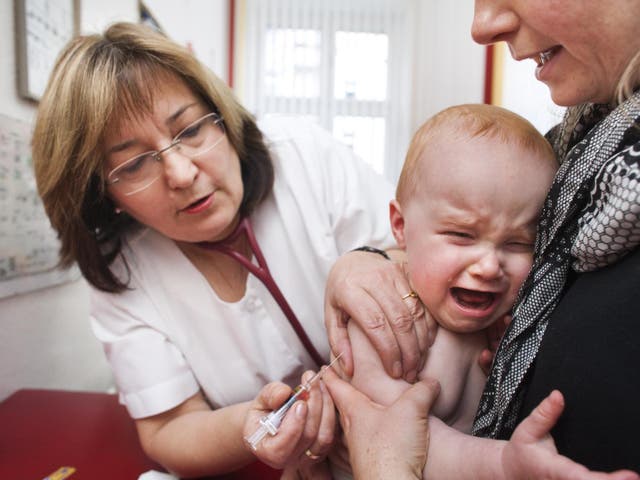 The MMR vaccination programme means measles has been 'eradicated' in the UK but new cases are brought in from overseas, according to the WHO