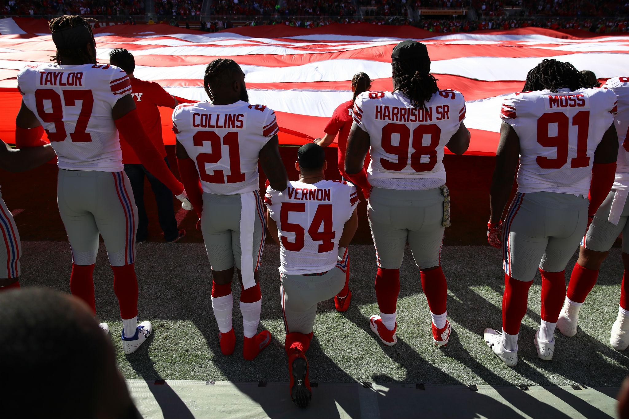 Olivier Vernon #54 of the New York Giants kneels during the national anthem (Photo by Ezra Shaw/Getty Images)