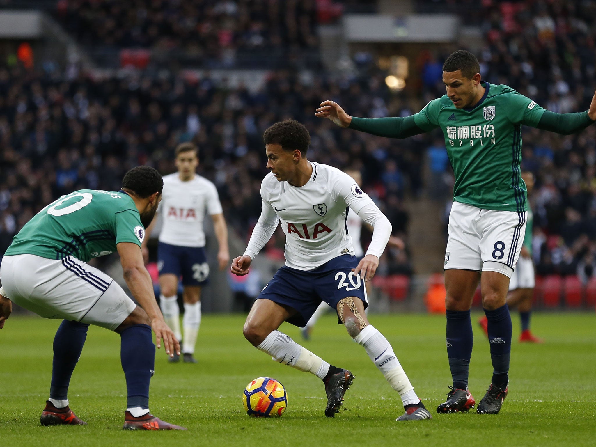 Dele Alli looks to get himself out of a tight situation