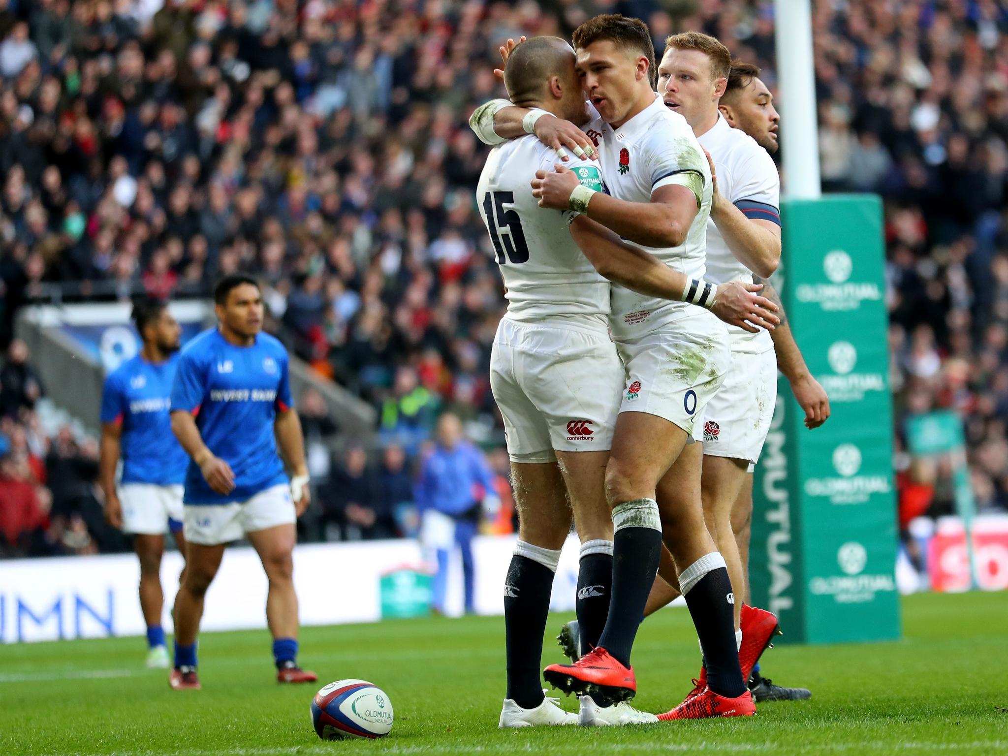 Mike Brown celebrates England's first try against Samoa