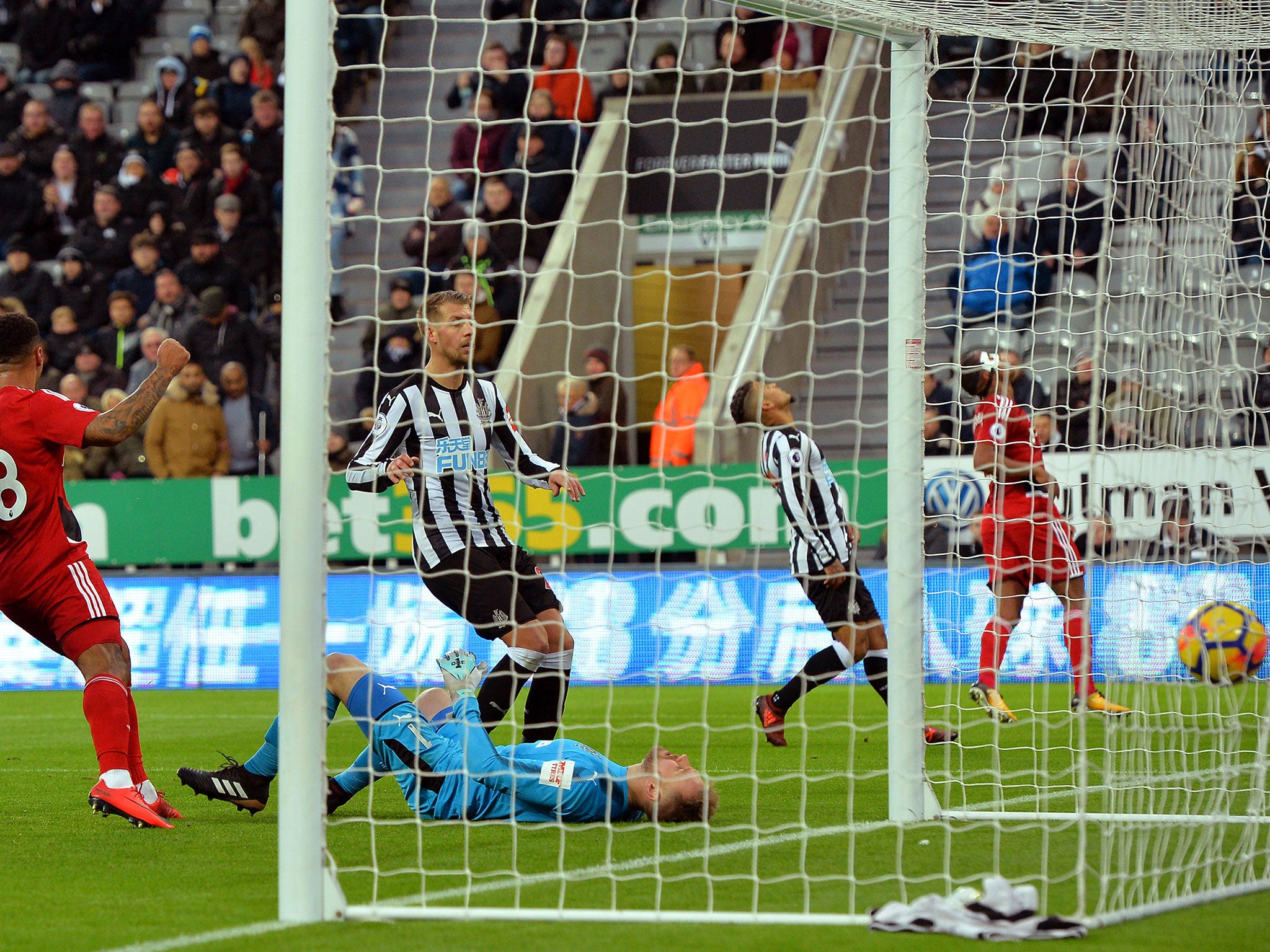 Deandre Yedlin reacts to scoring an own goal