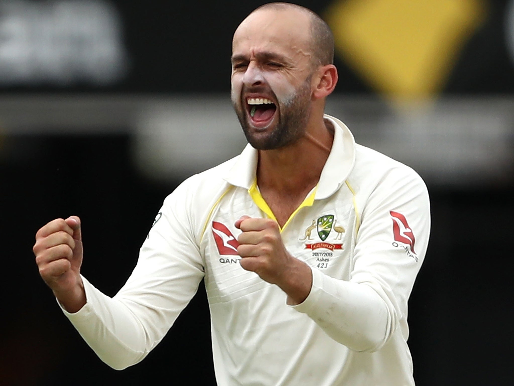 Nathan Lyon celebrates after having Mark Stoneman caught