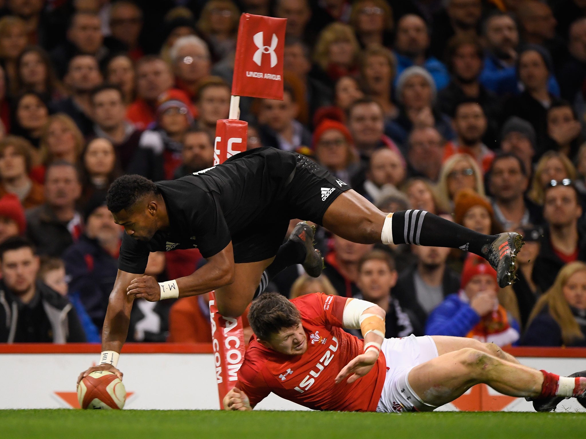 Waisake Naholo scores one of New Zealand's five tries against Wales