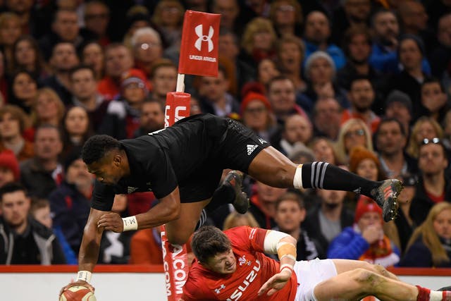 Waisake Naholo scores one of New Zealand's five tries against Wales