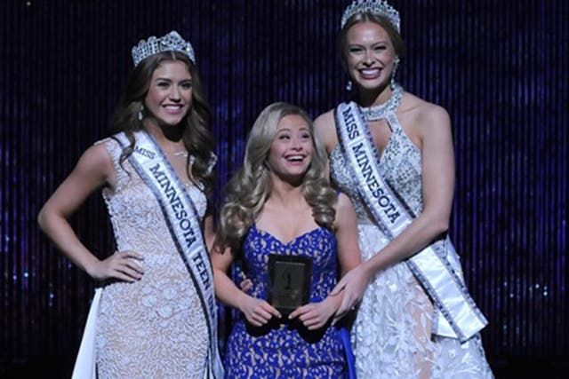 Mikayla Holgrem (centre) is believed to be the first person with Down's syndrome to compete in a Miss USA pageant
