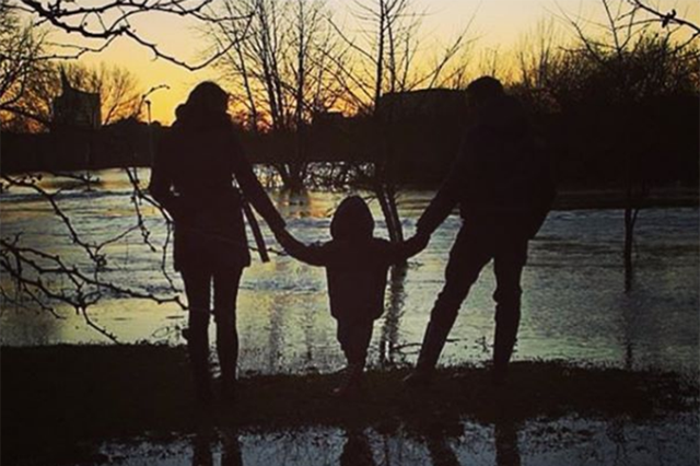Mr Thomas posted the image on Instagram of himself, his wife Gemma and their son Ethan, 8