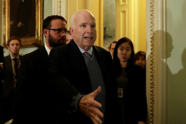 Senator John McCain, seen here on Capitol Hill on November 14, 2017, has regularly criticized Donald Trump