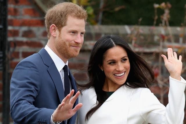 Prince Harry and Meghan Markle during an official photocall to announce their engagement