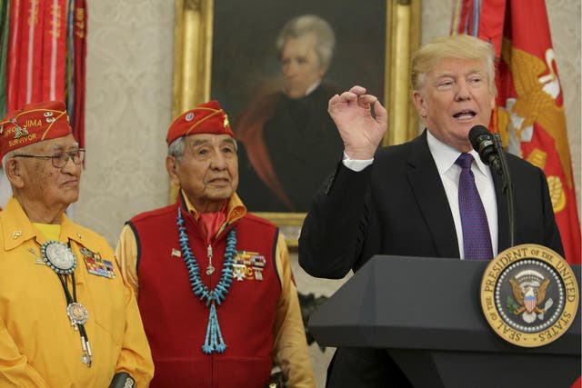 US President Donald Trump speaks during an event honouring members of the Native American code talkers in the Oval Office of the White House, on 27 November 2017