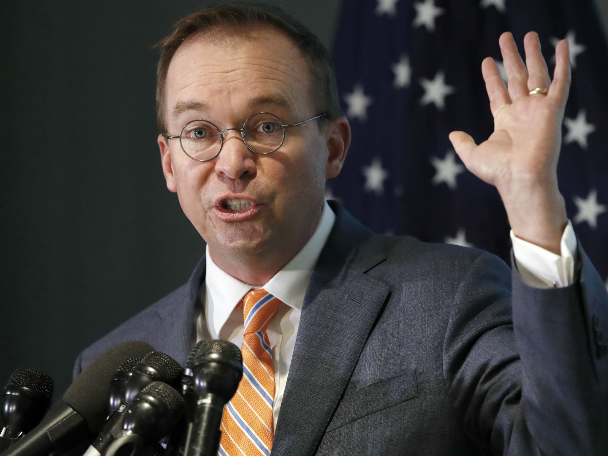 Mr Mulvaney speaks at a news conference at the Consumer Financial Protection Bureau