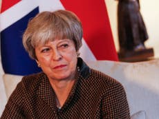 May under pressure to cancel Trump's state visit over tweets