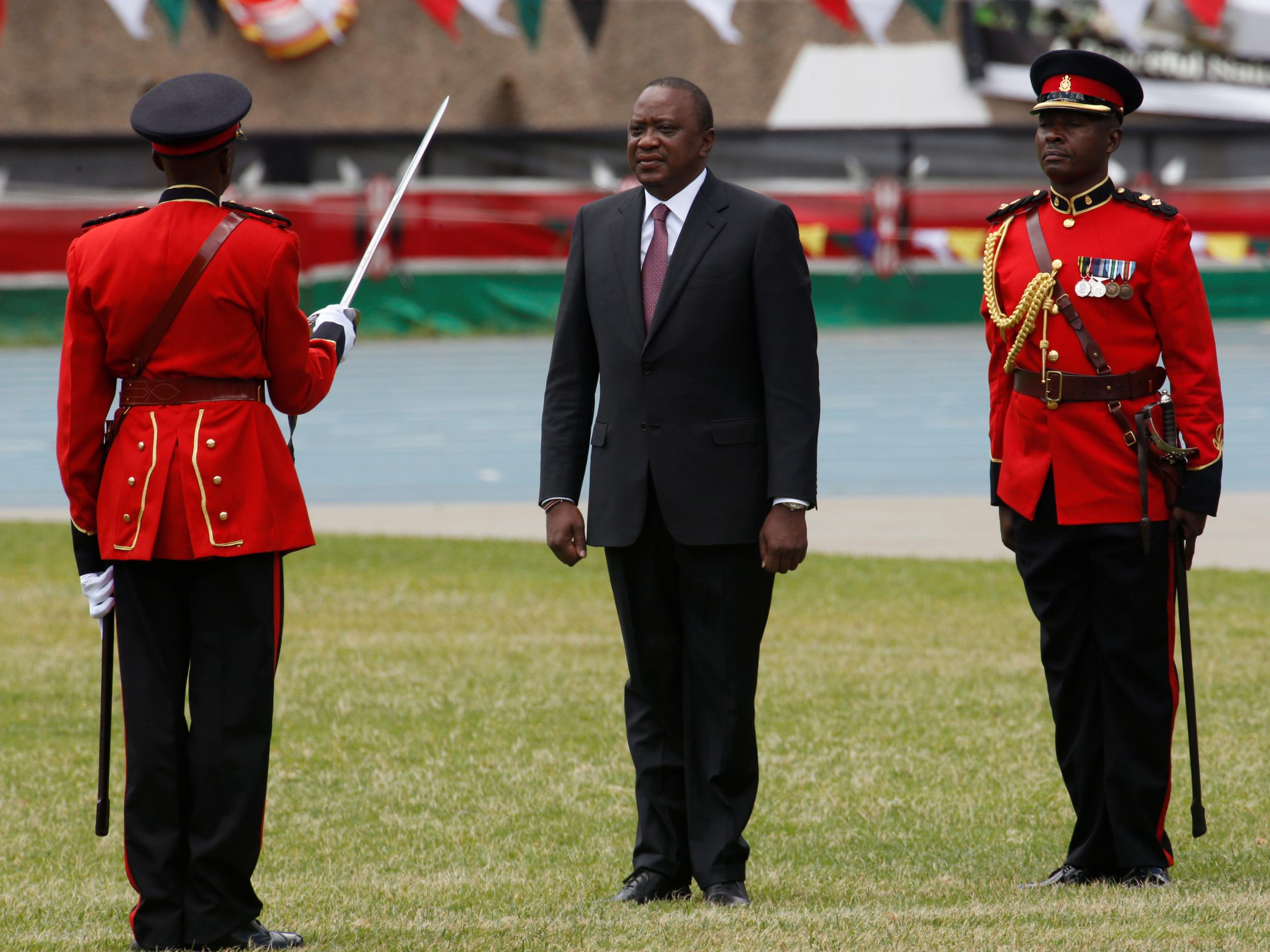 Kenya's President Uhuru Kenyatta takes oath of office during inauguration ceremony at Kasarani Stadium in Nairobi