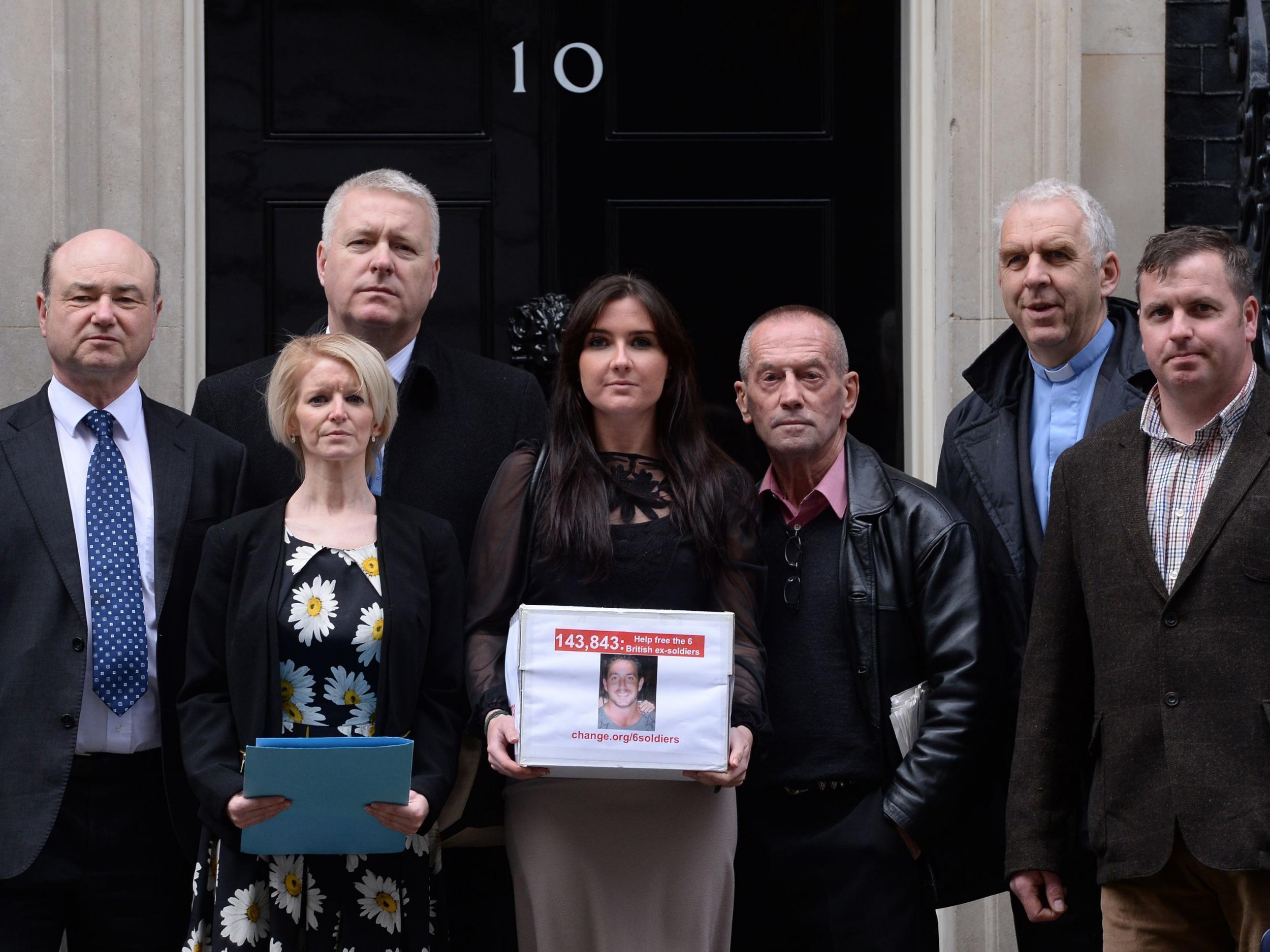 Yvonne McHugh (centre), the girlfriend of Billy Irving, is joined by family members of other 'Chennai Six' prisoners including Lisa Dunn (second left) as the group deliver a position to Downing Street in March 2014