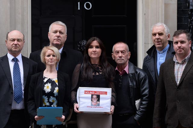 Yvonne McHugh (centre), the girlfriend of Billy Irving, is joined by family members of other 'Chennai Six' prisoners including Lisa Dunn (second left) as the group deliver a position to Downing Street in March 2014