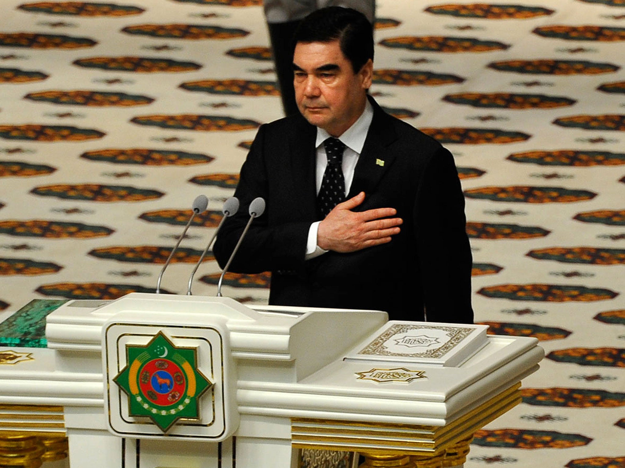 Turkmenistan's president Gurbanguly Berdimuhamedow swears an oath during his inauguration as President in Ashgabad on February 17, 2017