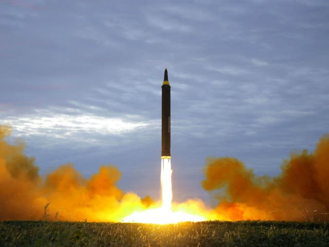 A missile is launched during a long and medium-range ballistic rocket launch drill in this undated photo released by North Korea's Korean Central News Agency (KCNA) in Pyongyang on August 30, 2017