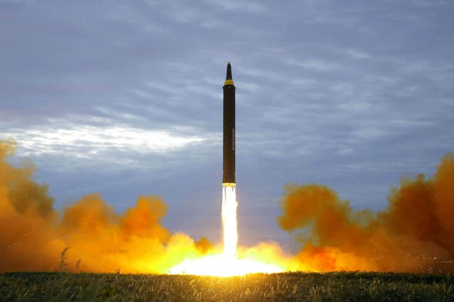 A missile is launched during a long and medium-range ballistic rocket launch drill in this undated photo released by North Korea's Korean Central News Agency (KCNA) in Pyongyang on August 30, 2017