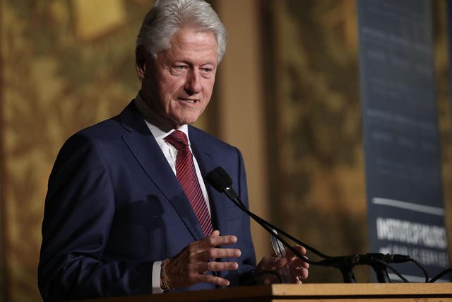 Former US President Bill Clinton speaks at Georgetown University's Gaston Hall in November (Photo by Win McNamee/Getty Images)