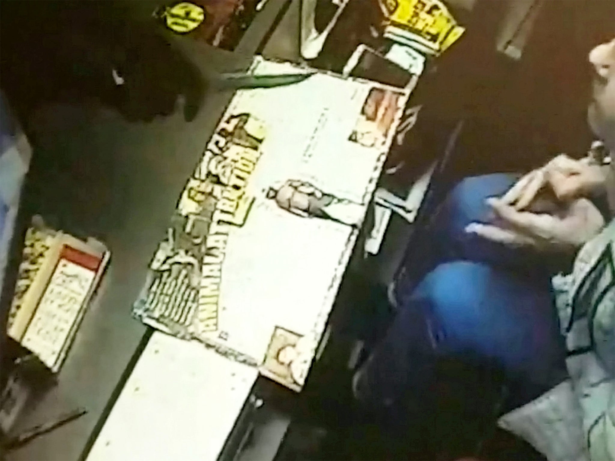 Cameras recorded one of the robbers wielding an eight-inch knife