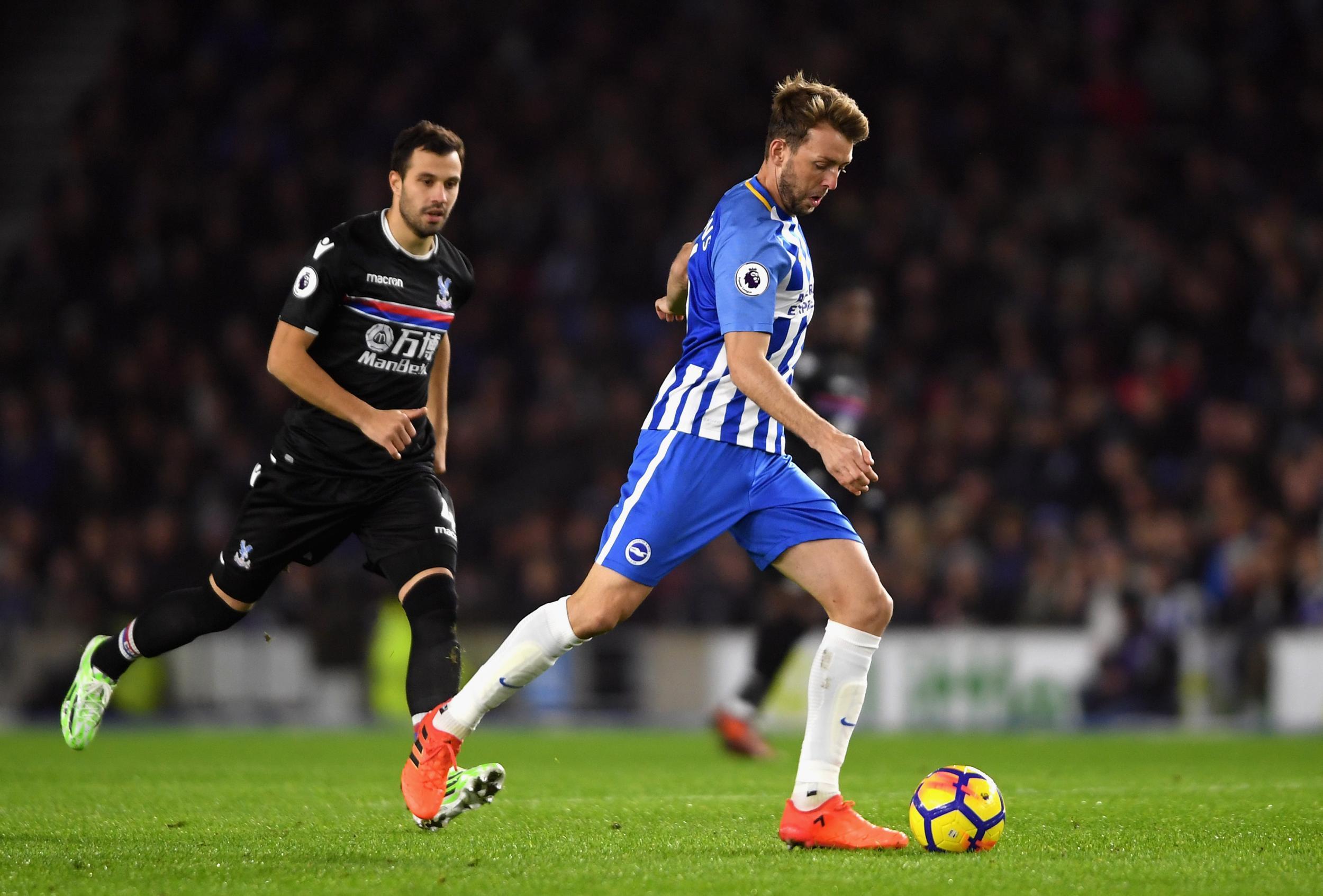 Dale Stephens gets on the ball in midfield for Brighton