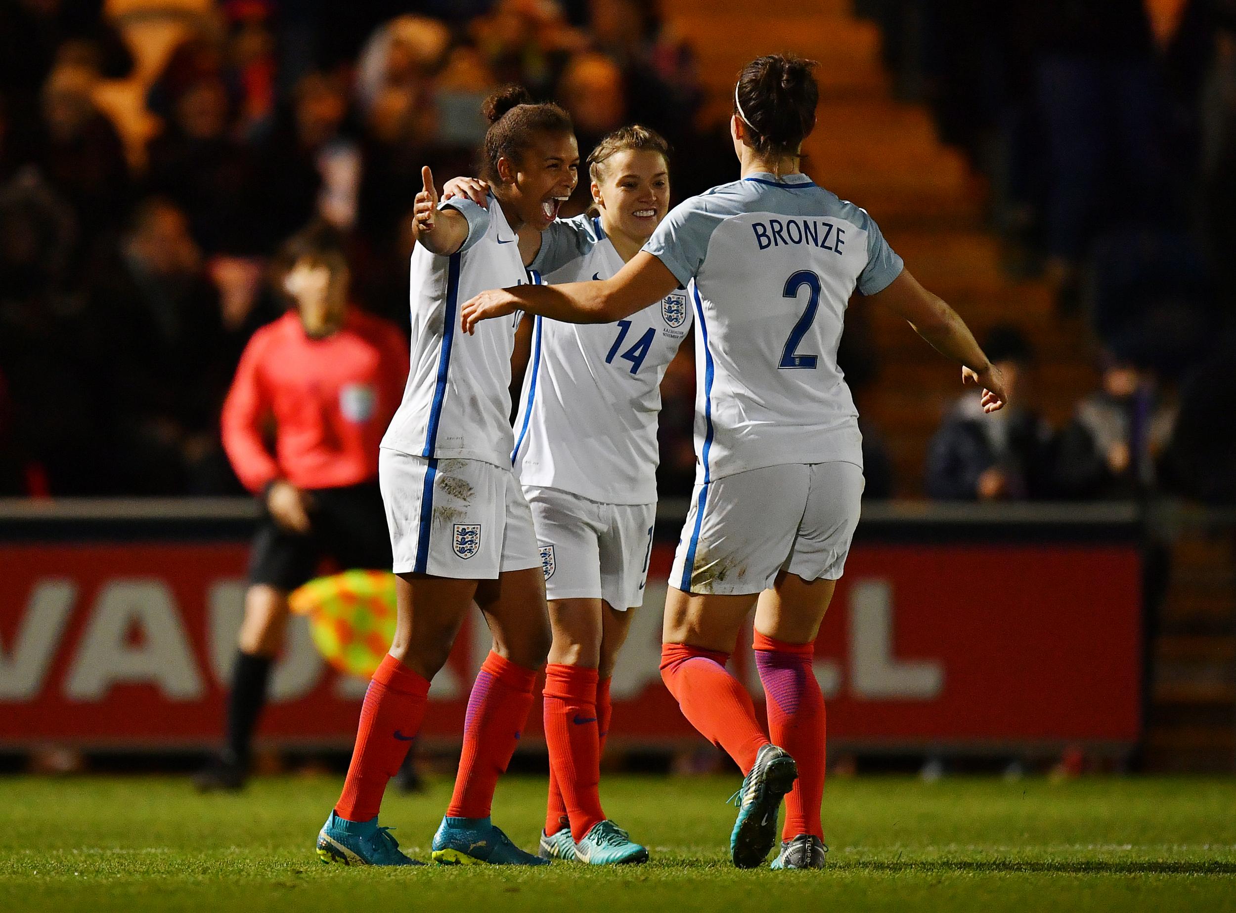 NIkita Parris, left, celebrates scoring England's third of the game