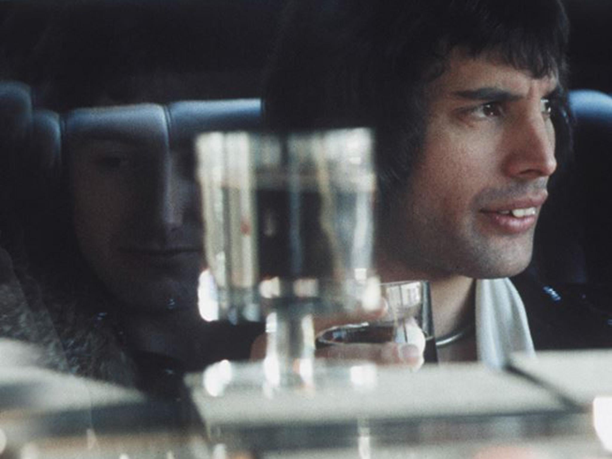 Behind the glass: Freddie looking reflective in a New York Cadillac