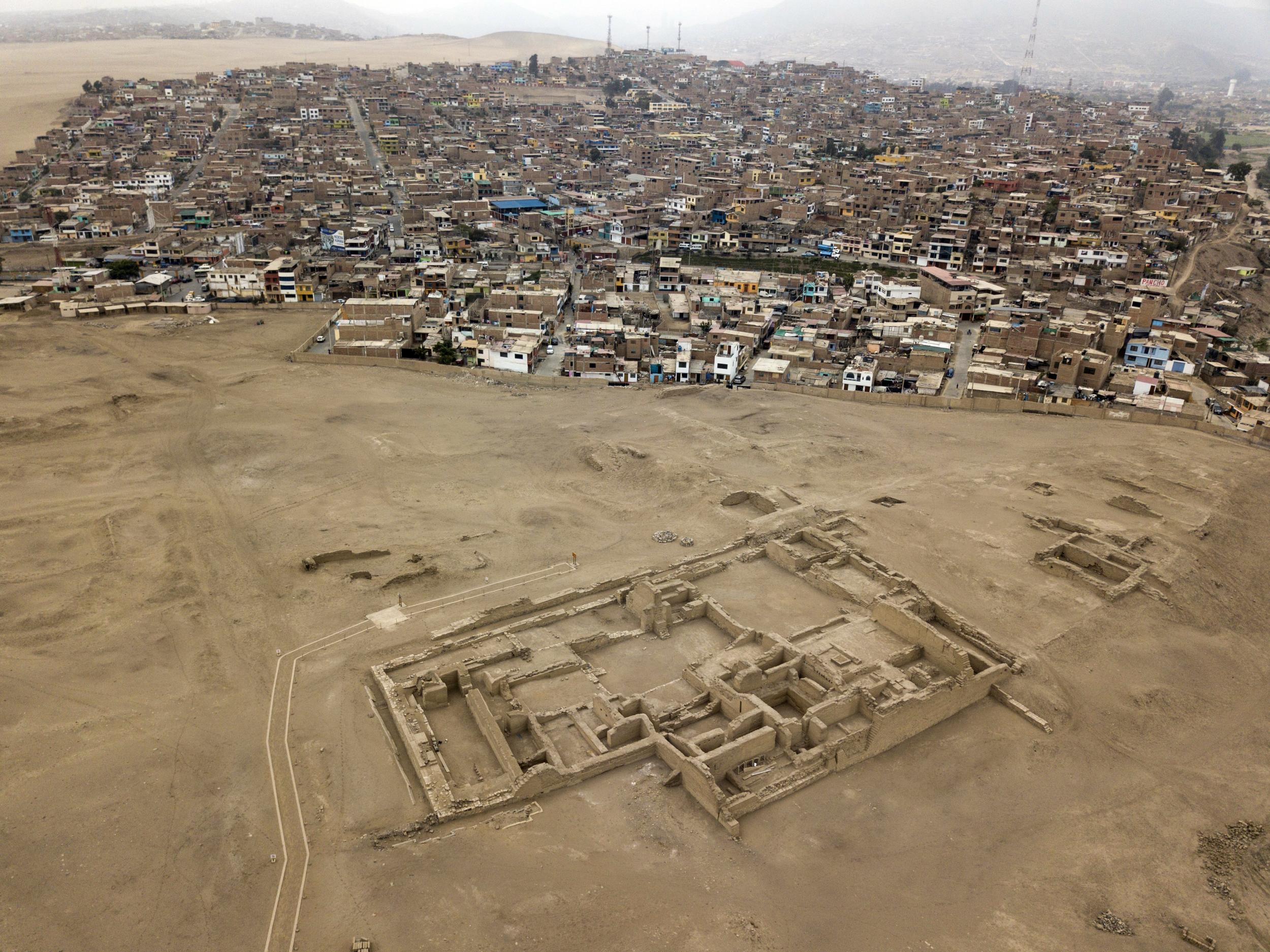 Homes in the Lurin district stand near the archeological site Pachacamac