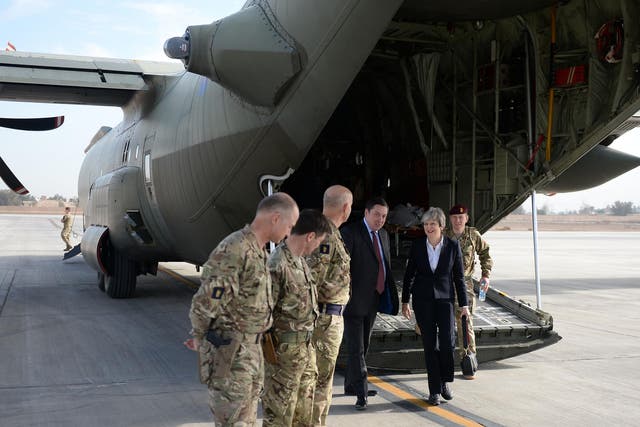 Theresa May makes a suprise visit to Camp Taji, near Baghdad