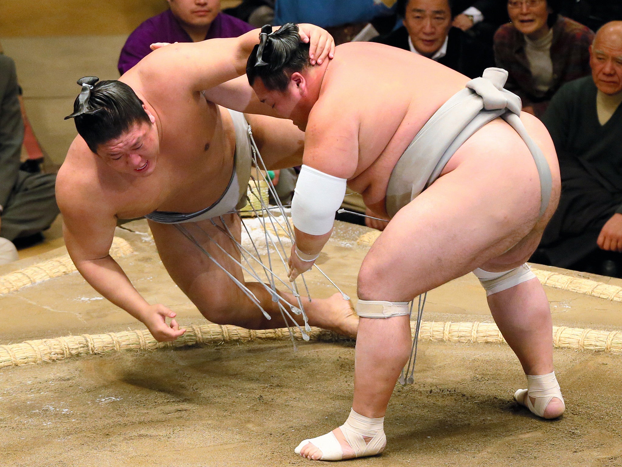 Takanoiwa (L) was badly injured in the incident