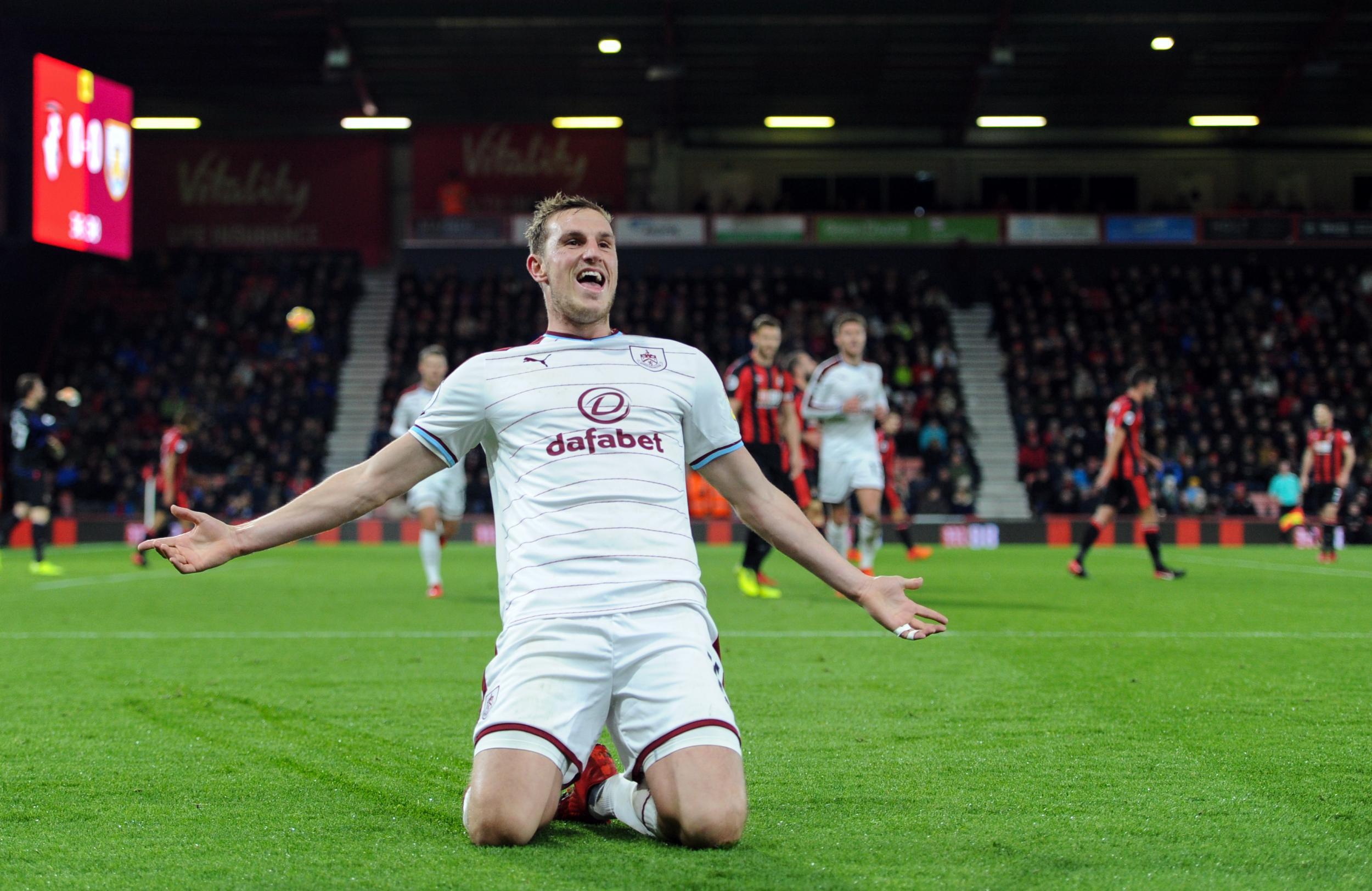 &#13;
Chris Wood slides in celebration &#13;