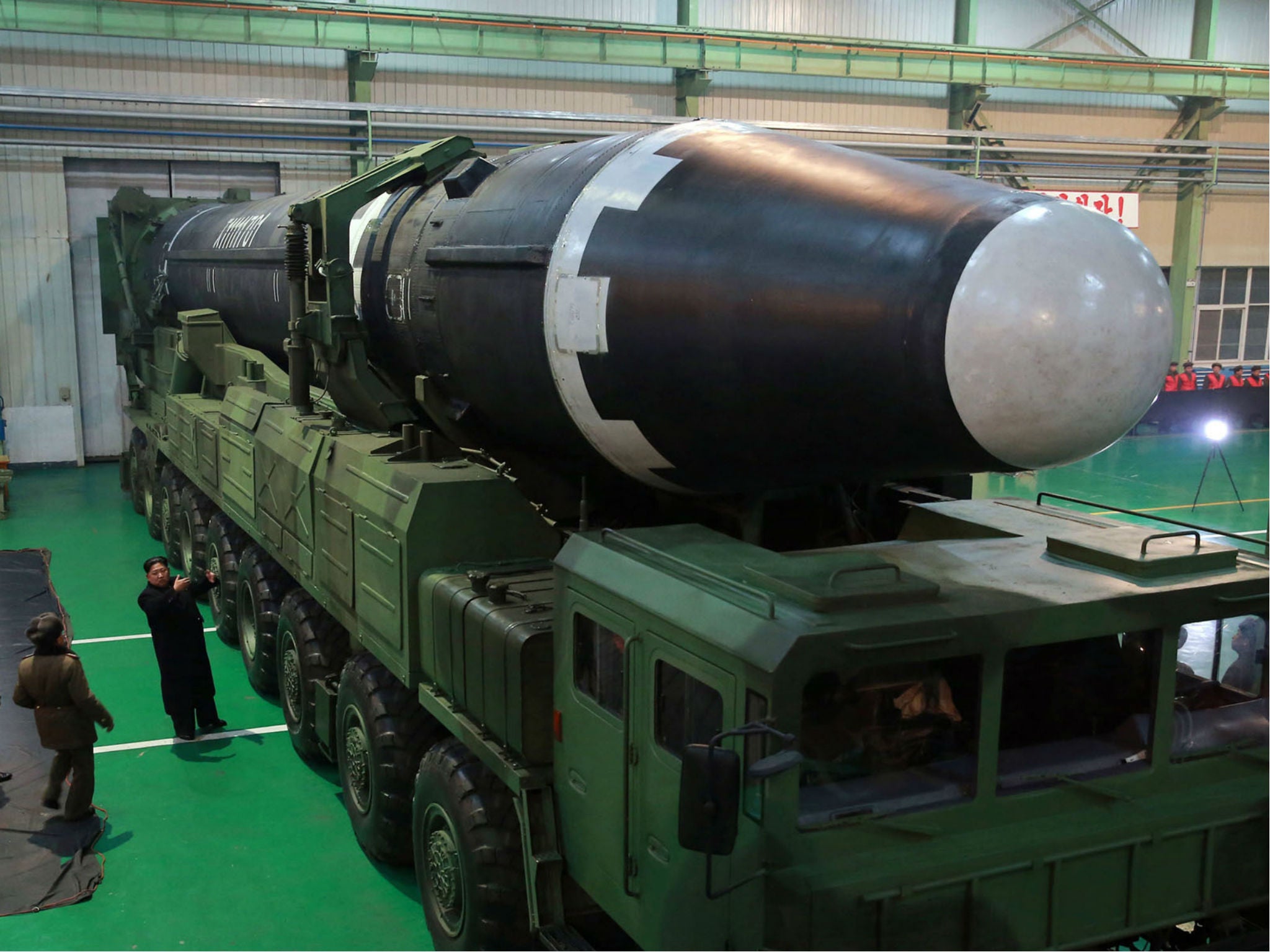 North Korean leader Kim Jong-un inspects the Hwasong-15 intercontinental ballistic missile