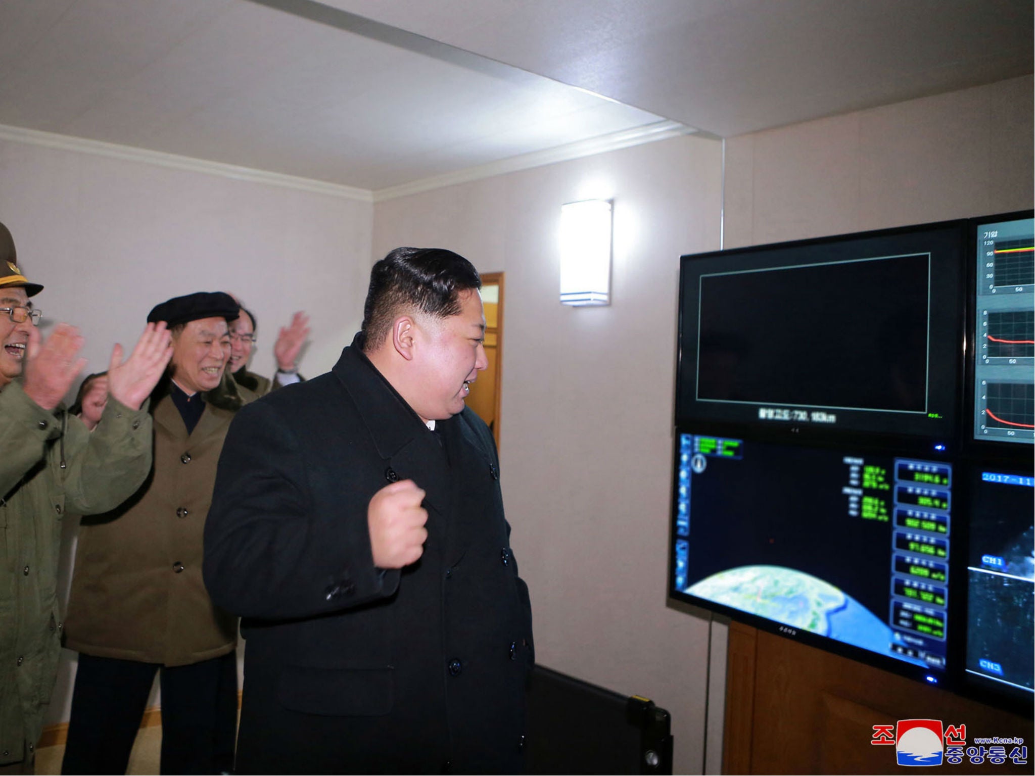 In this undated photo provided on Thursday, Nov. 30, 2017, by the North Korean government, North Korean leader Kim Jong Un inspects an intercontinental ballistic missile test in North Korea on Wednesday, Nov. 29