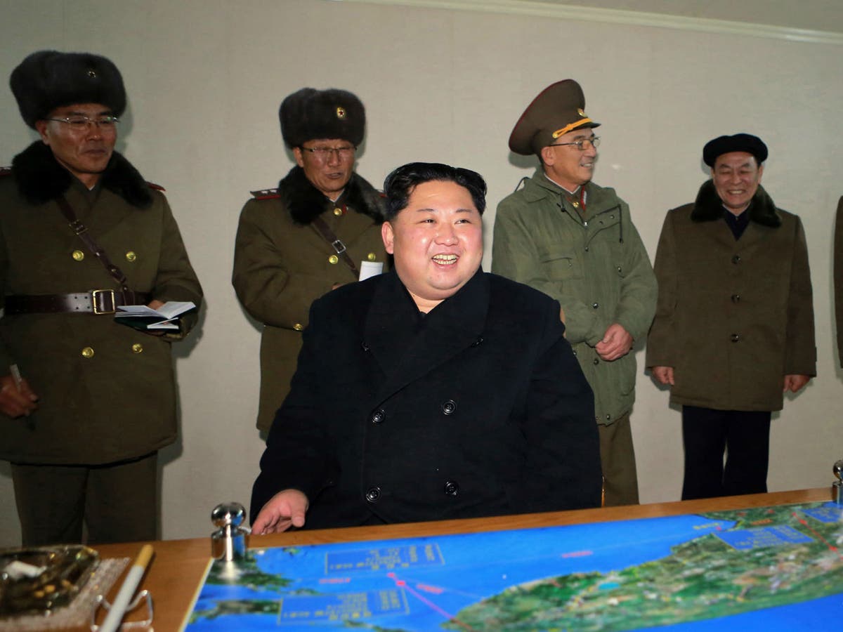 North Korea releases photos of Kim Jong-un celebrating latest missile ...