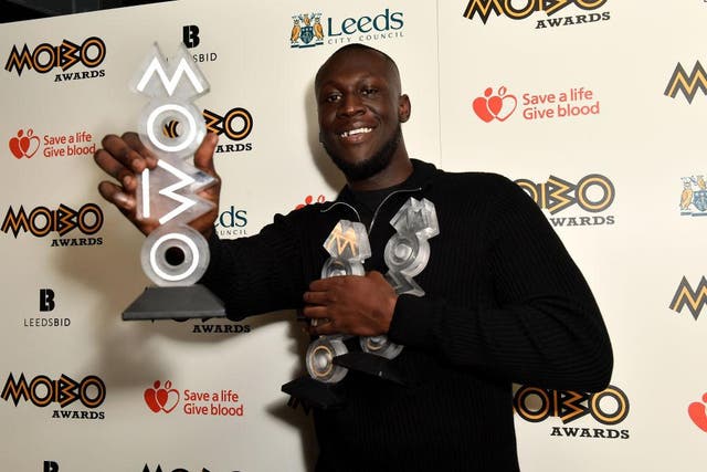 Stormzy with his three MOBO Awards at the 2017 ceremony in Leeds