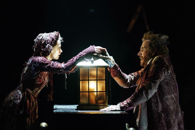 Melissa Allan (Little Fan) and Rhys Ifans (Ebenezer Scrooge) in ‘A Christmas Carol’ at The Old Vic
