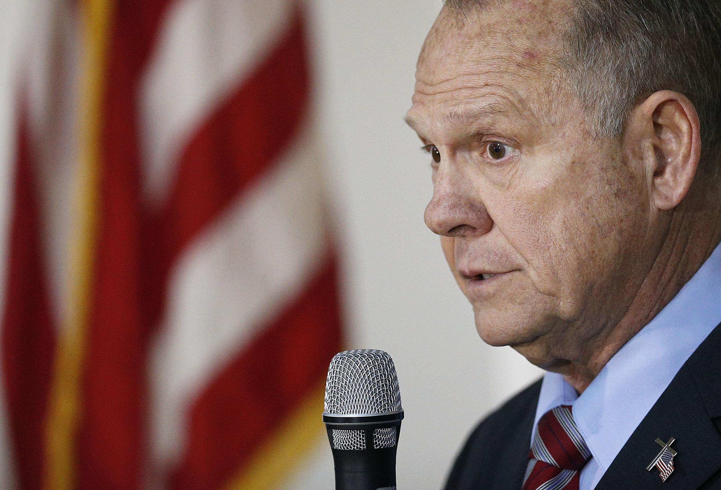 Former Alabama Chief Justice and U.S. Senate candidate Roy Moore speaks at a campaign rally