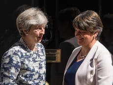 DUP threatens to pull support for May over Irish border compromise