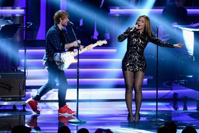 Ed Sheeran performs with Beyonce at a Stevie Wonder tribute at the Grammys in 2015
