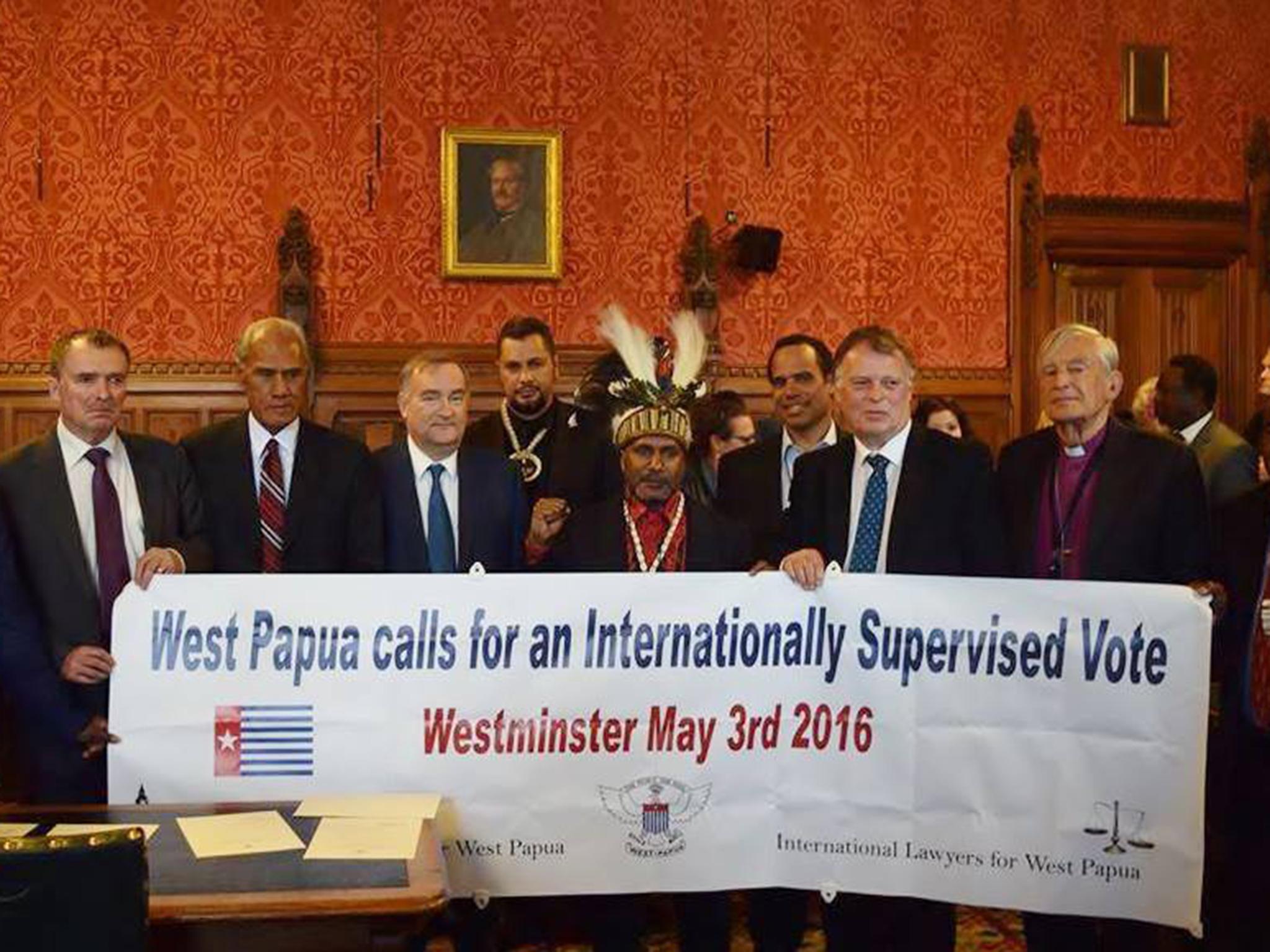 Free West Papua independence leader Benny Wenda (centre) was granted political asylum from the UK in the early 2000s