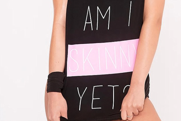 The £4 gym vest has been accused of promoting eating disorders
