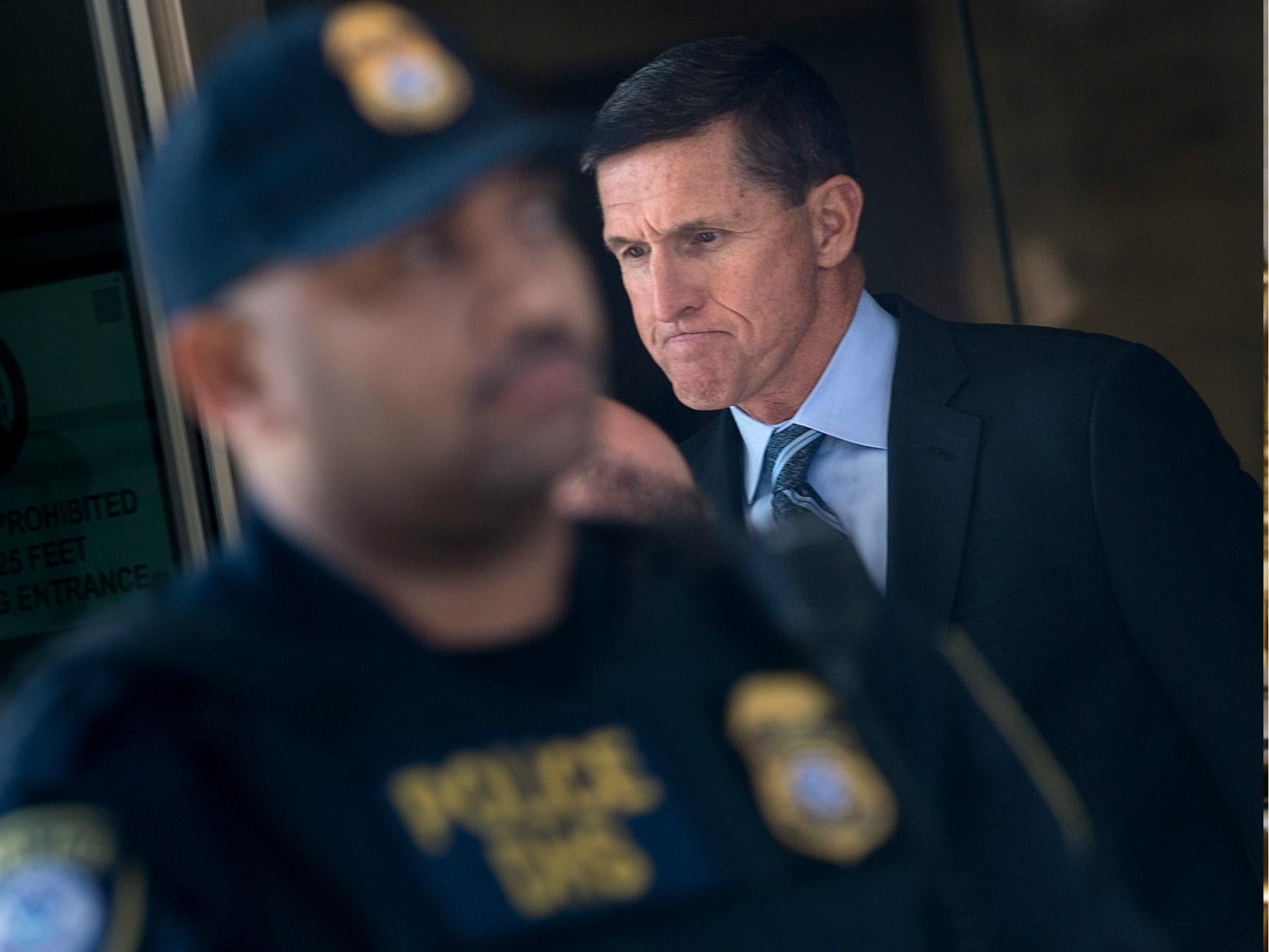 Michael Flynn, former national security adviser to US President Donald Trump, leaves Federal Court 1 December 2017 in Washington, DC.