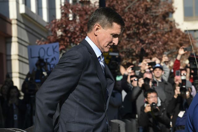 Michael Flynn leaves court after entering his guilty plea on Friday