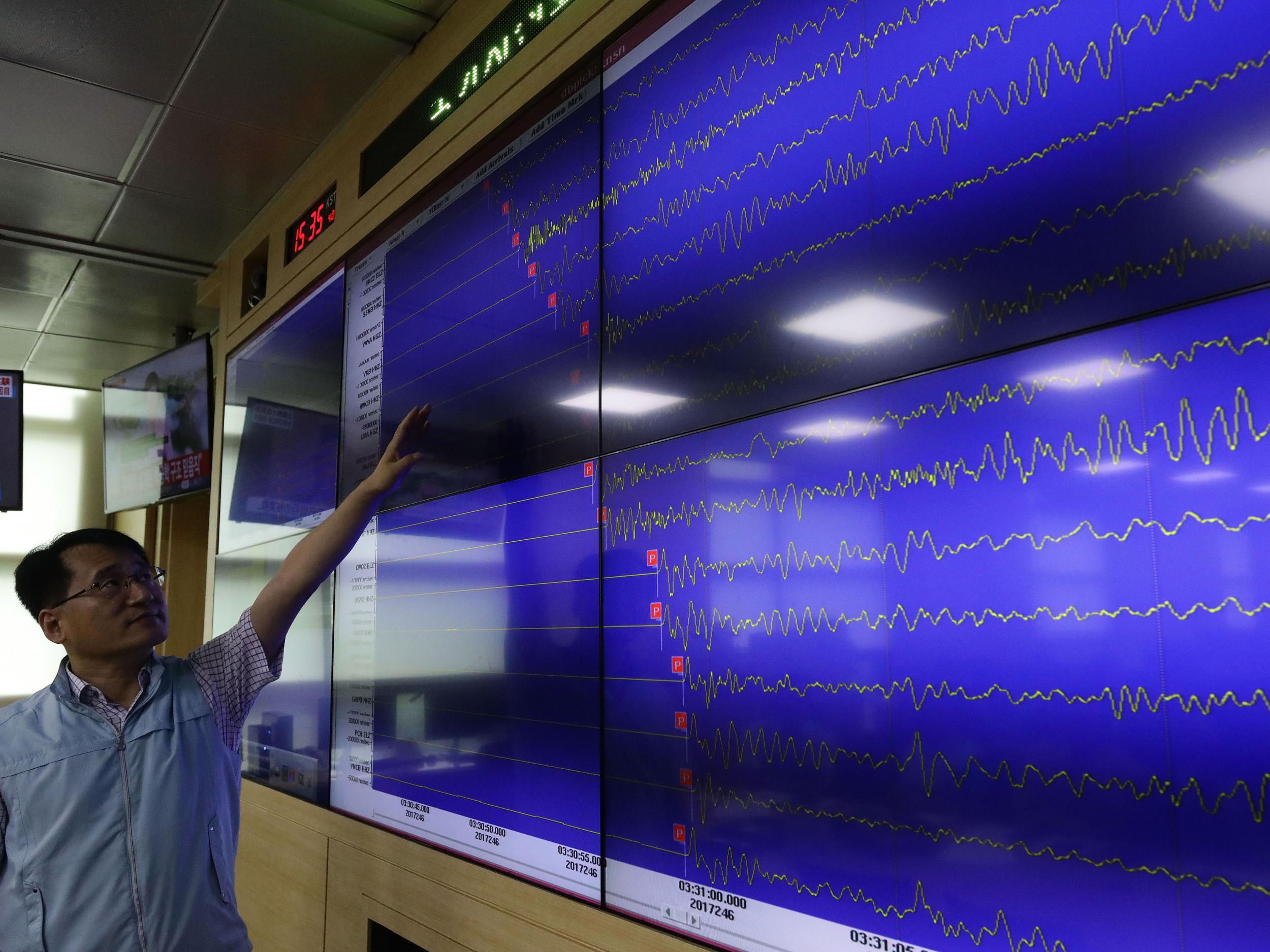 Ryoo Yong-Gyu, a director of the National Earthquake and Volcano Center, shows seismic waves taking place in North Korea on a screen at the Korea Meteorological Administration center on 3 September, 2017 in Seoul, South Korea.