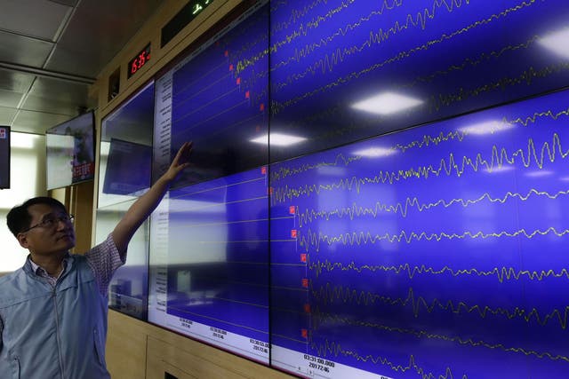Ryoo Yong-Gyu, a director of the National Earthquake and Volcano Center, shows seismic waves taking place in North Korea on a screen at the Korea Meteorological Administration center on 3 September, 2017 in Seoul, South Korea.