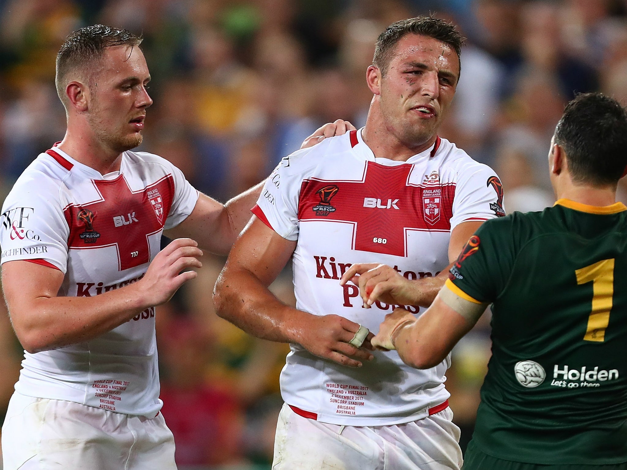 Sam Burgess squares up to Billy Slater in the dying seconds of the match