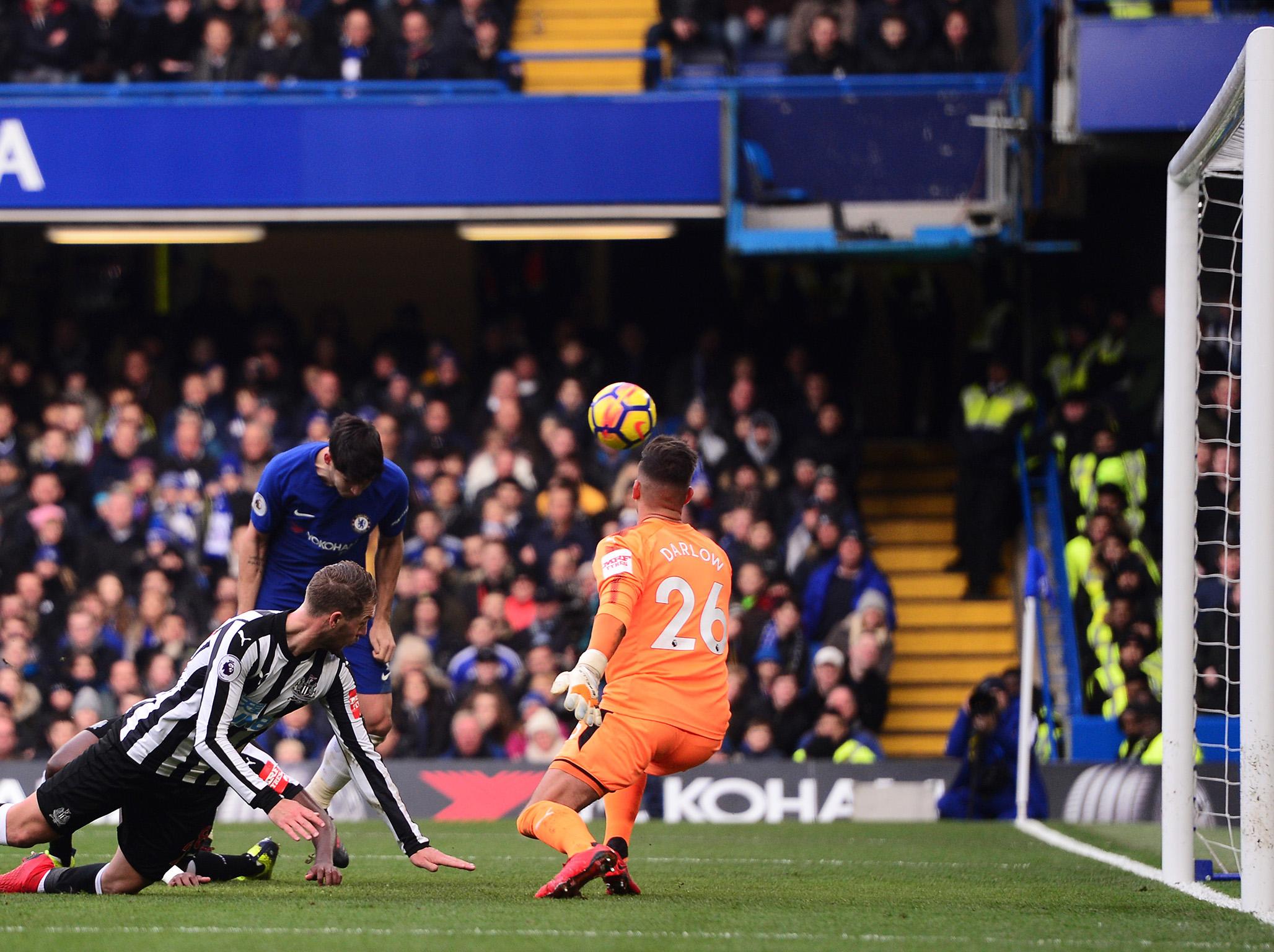 Alvaro Morata stoops to put Chelsea in front